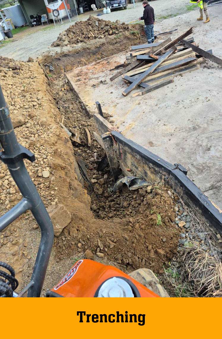 Trench dug along a concrete slab edge, labelled Trenching