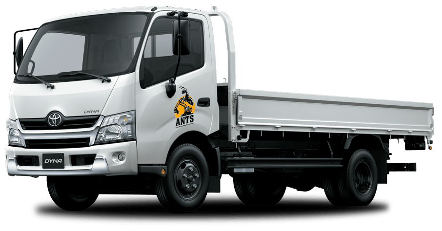 White tray truck with the ANTS logo on the door